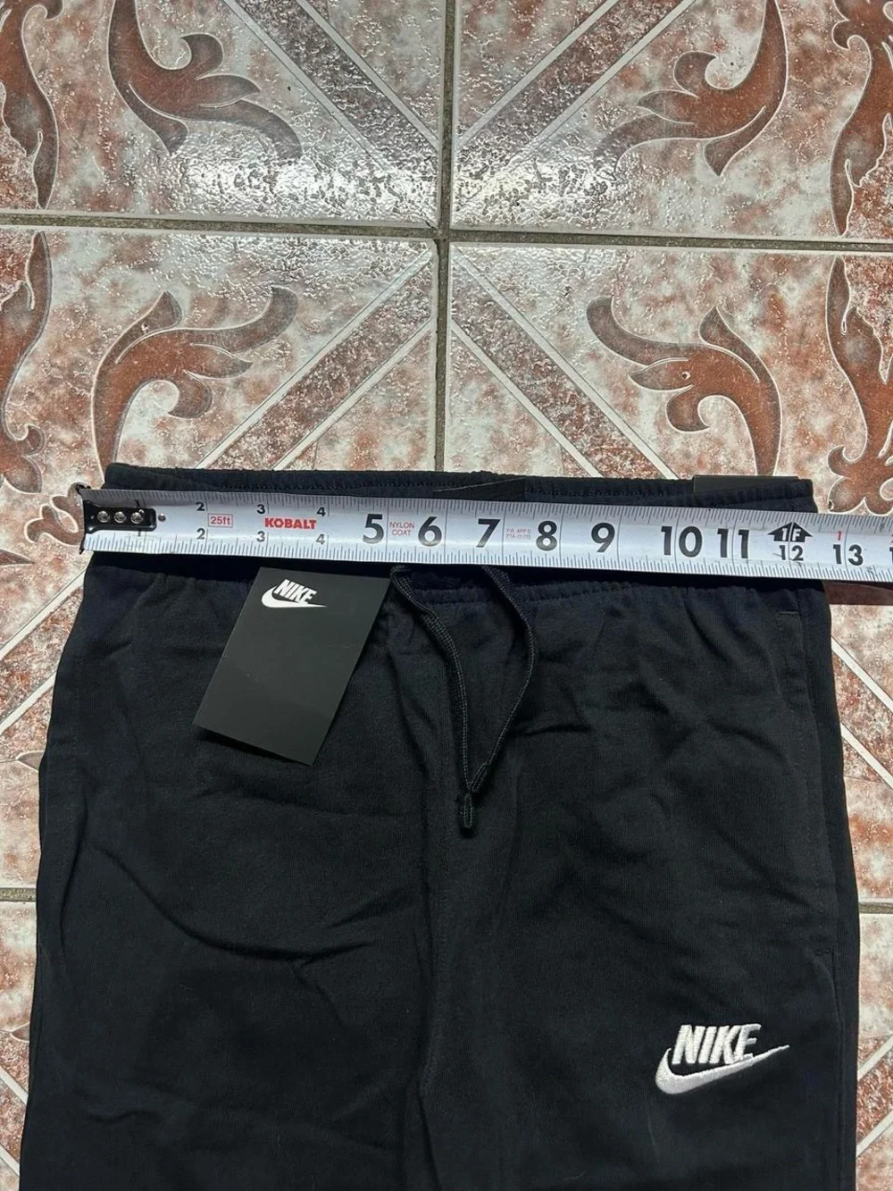 Nike Kids Black Jogger Sweatpants with White Swoosh
